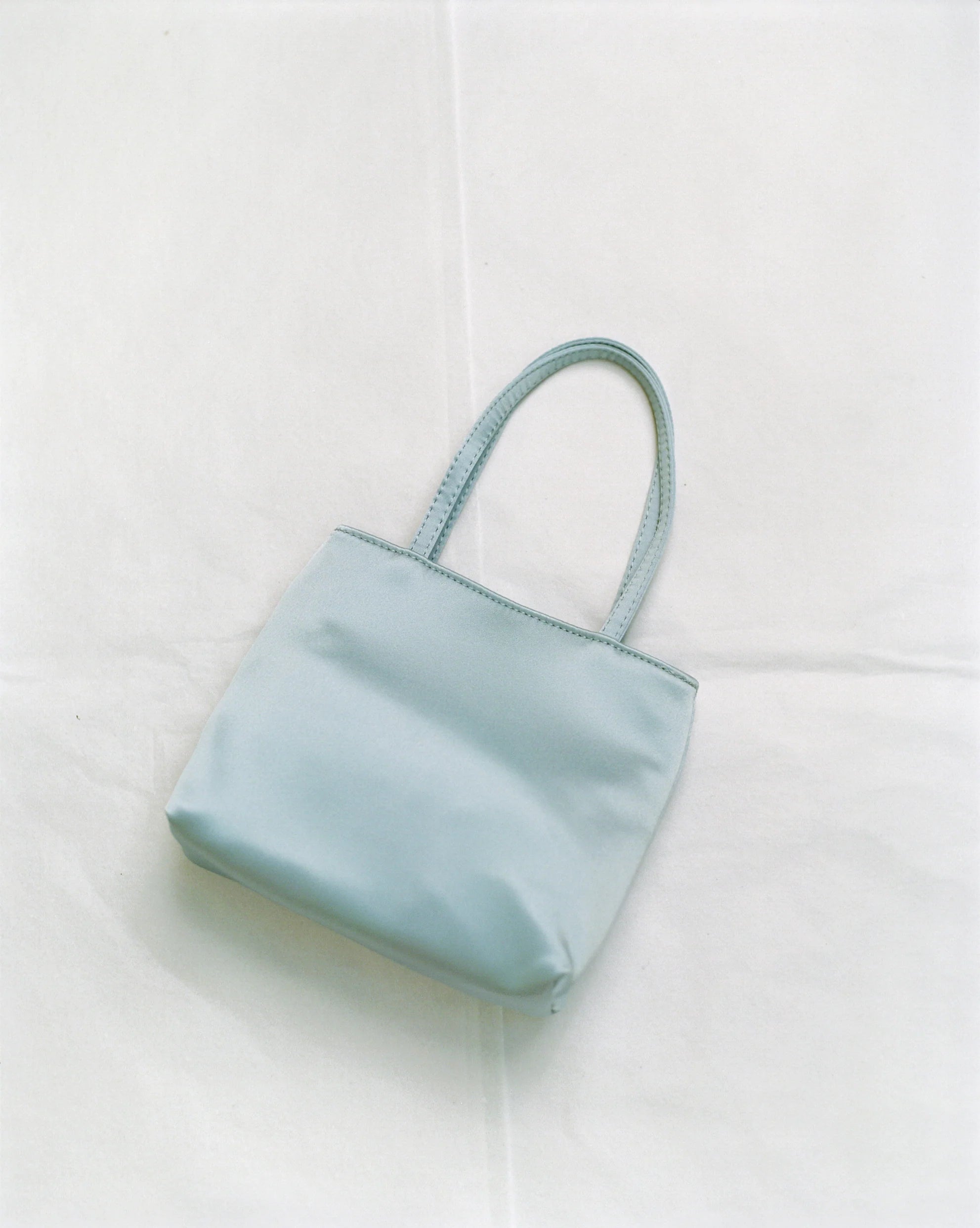 Home of Hai little silk bag light blue
